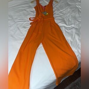 NEON ORANGE FLARE LEG JUMPSUIT - size 6